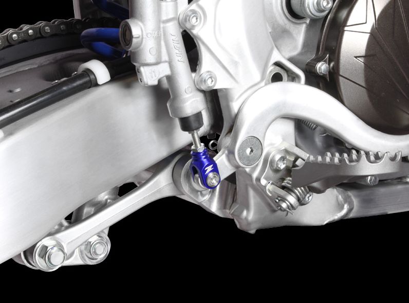 Úchyt brzdového pedálu ZETA Rear Brake Clevis Suzuki RMZ 250/450