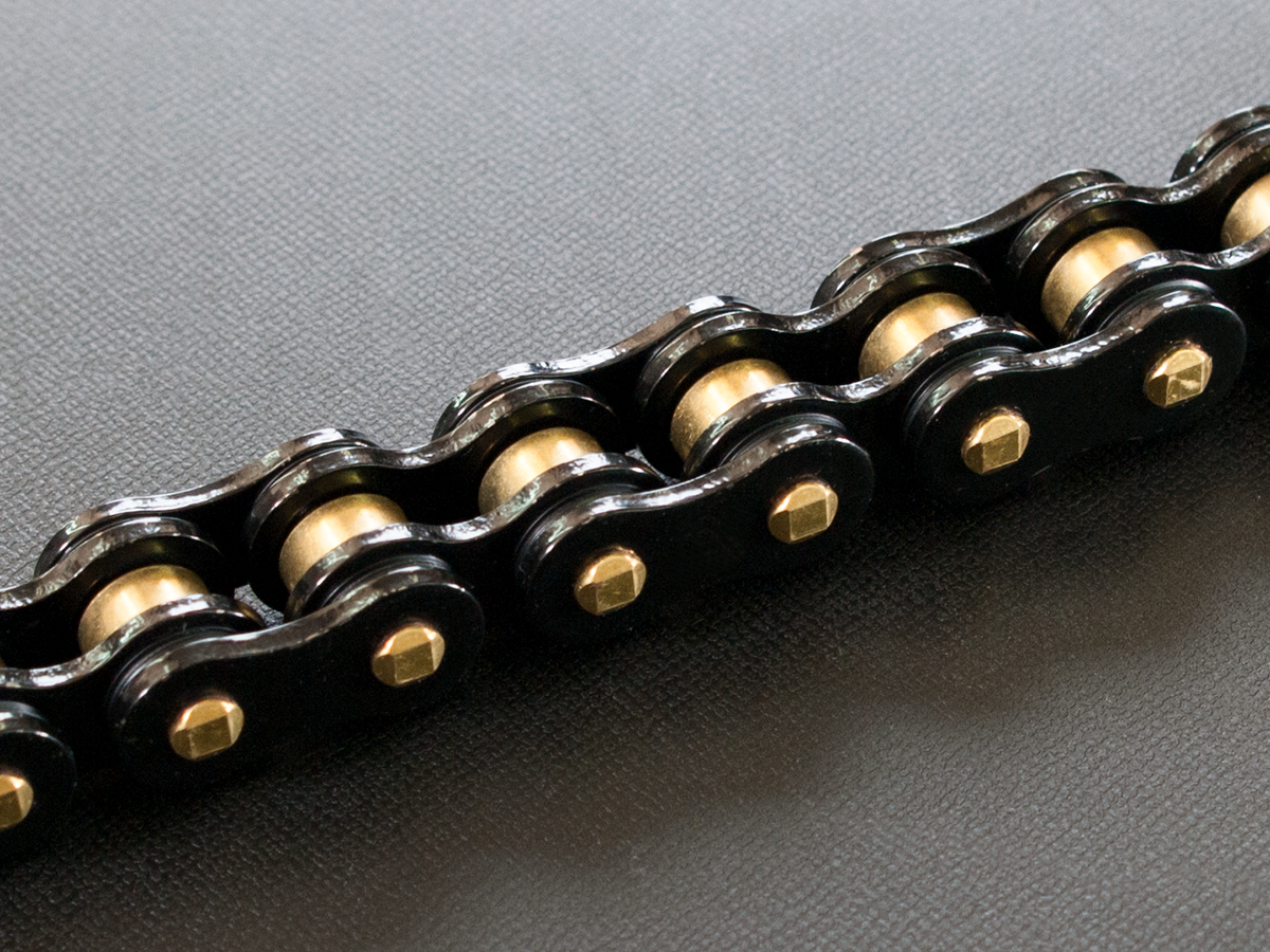 Motocyklový řetěz RK 520 ZXW barva černá/zlatá 116 článků