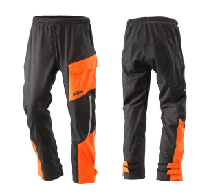 Pláštěnka - pláštěnkové voděodolné kalhoty KTM RAIN PANTS  barva černá/oranžová